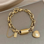 Tjockt armband med hjärtan | Guld