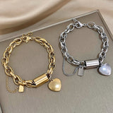 Tjockt armband med hjärtan | Guld