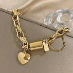 Tjockt armband med hjärtan | Guld