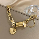 Tjockt armband med hjärtan | Guld