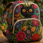 Quiltad ryggsäck – Svart katt och vilda blommor